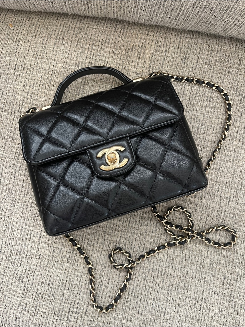 CHANEL Black Quilted Leather Top-Handle Crossbody with Gold Hardware